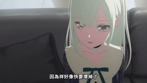 a girl with white hair is sitting on a couch and has chinese writing on her face