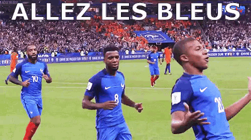 a group of soccer players are running on a field with the words allez les bleus behind them