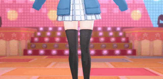 a girl in a blue jacket and black thigh high socks is standing on a stage
