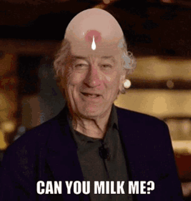 a man with a nipple on his head and the words can you milk me on the bottom