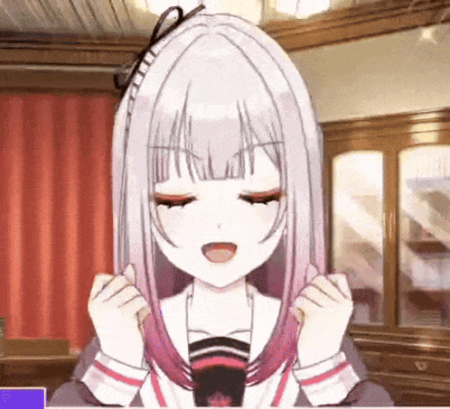 a girl with white hair and pink hair is sitting in a room .