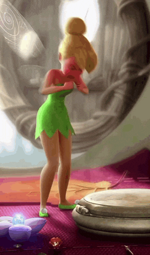tinkerbell is standing in front of a mirror and looking at herself