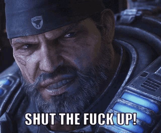 a man with a beard is wearing a hat that says ' shut the fuck up '