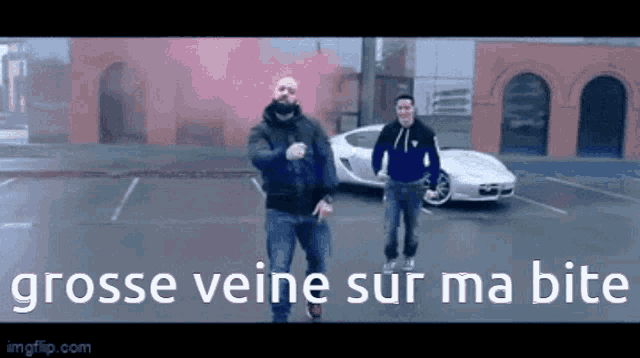two men are dancing in a parking lot with the words " grosse veine sur ma bite " written below them