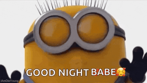 a close up of a minion wearing goggles and saying good night babe .