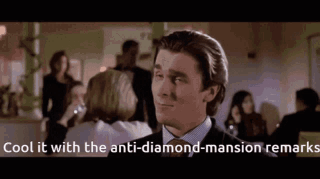 a man in a suit and tie says cool it with the anti-diamond-mansion