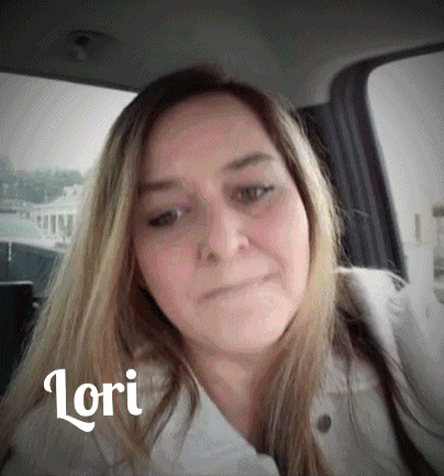 a woman in a car with the name lori written on her face
