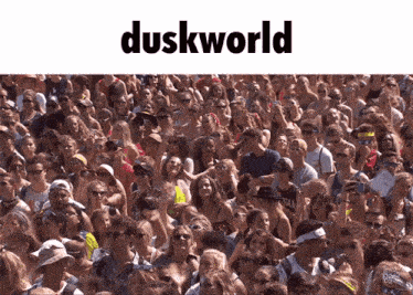 a large crowd of people are gathered in front of a duskworld sign