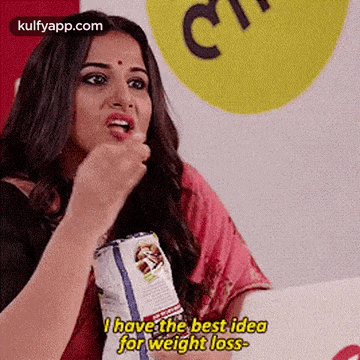 a woman is eating a bag of chips and saying `` i have the best idea for weight loss . ''