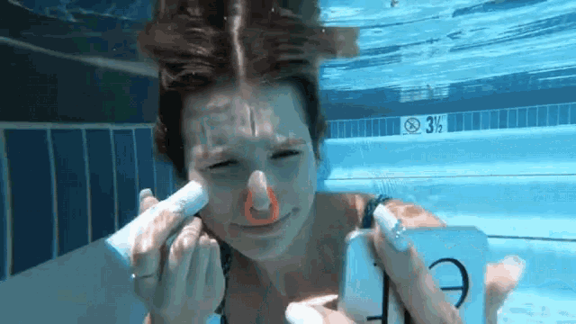 Applying Concealer Underwater GIF - Applying Concealer Underwater Waterproof Makeup GIFs