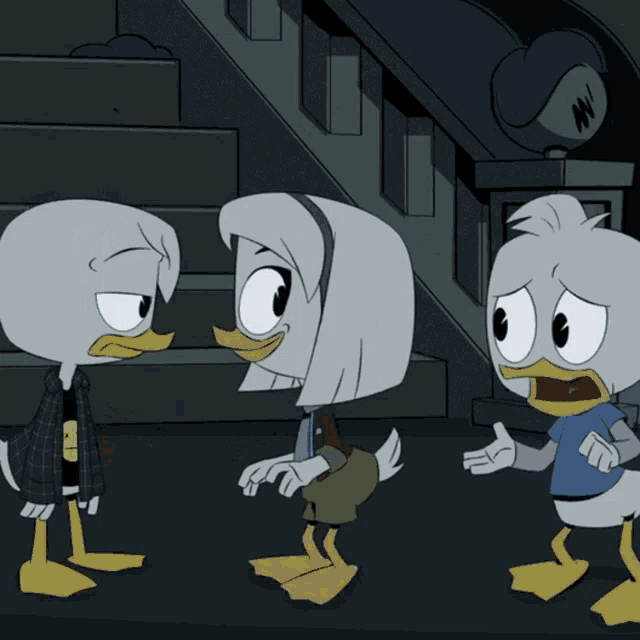 three cartoon ducks are standing next to each other and one of them has a smiley face on his watch