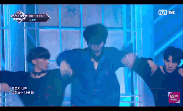 a group of men are dancing on a stage and the words count down are on the bottom