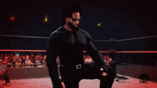a man and a woman are in a wrestling ring