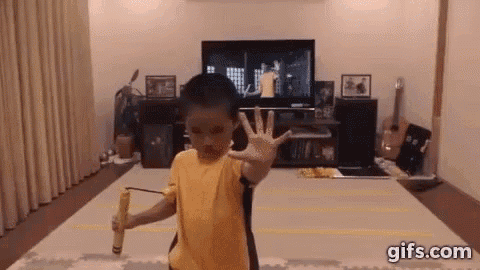 Kid Silly GIF - Kid Silly Nunchuk GIFs