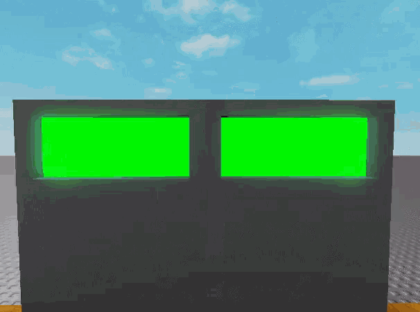 a green screen is displayed on a wall