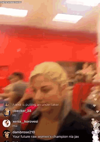a woman is talking on a cell phone in front of a crowd of people