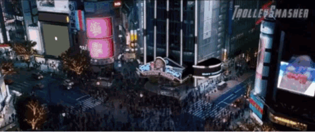 an aerial view of a city at night with the words trolled smashed in the corner