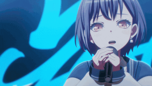 a girl singing into a microphone in front of a blue background