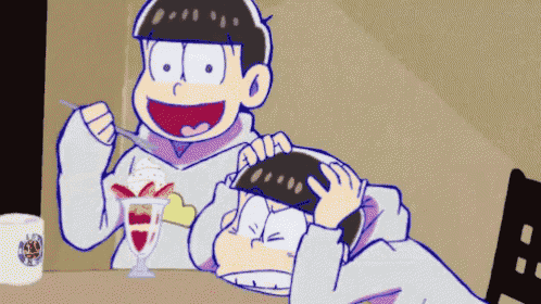 two cartoon characters are sitting at a table eating ice cream together