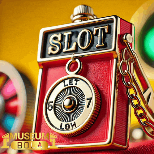 a red and gold slot machine with a key chain
