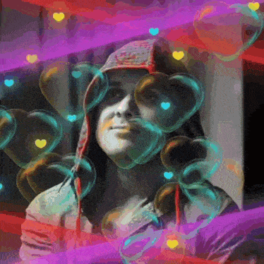 a woman in a hat is surrounded by heart shaped bubbles