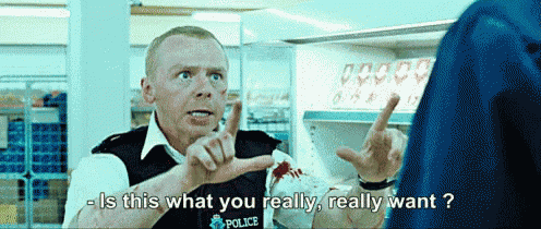 a man in a police uniform is talking to another man in a store and says " is this what you really really want "