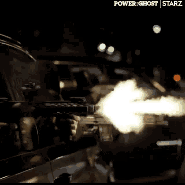 a person is holding a gun in front of a car with power ghost starz written on the bottom right