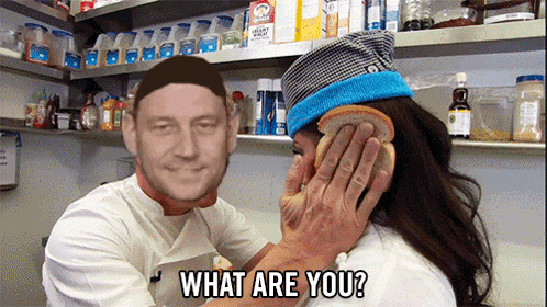 a man is putting a piece of bread on a woman 's face with the words " what are you " written below him