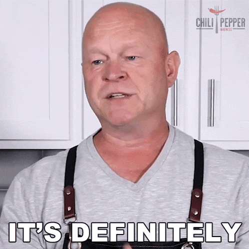 a man in an apron says it 's definitely in a kitchen