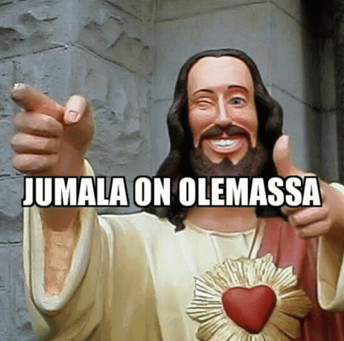 a statue of jesus giving a thumbs up with jumala on olemassa written underneath him
