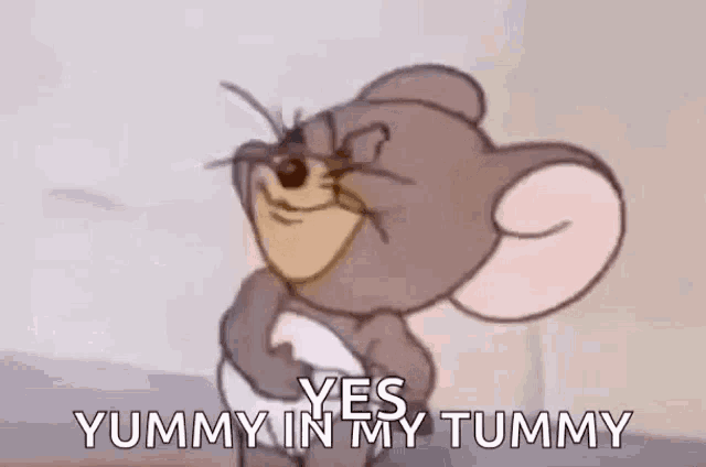 a cartoon mouse is smiling and saying `` yes , yummy in my tummy ''
