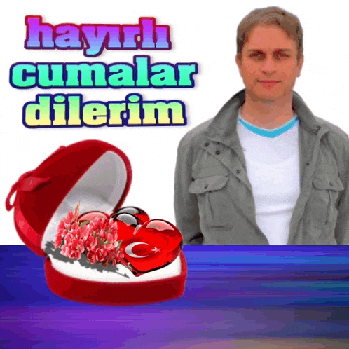 a man stands in front of a red box with a heart in it and the words hayırlı cumalar dilerim above him