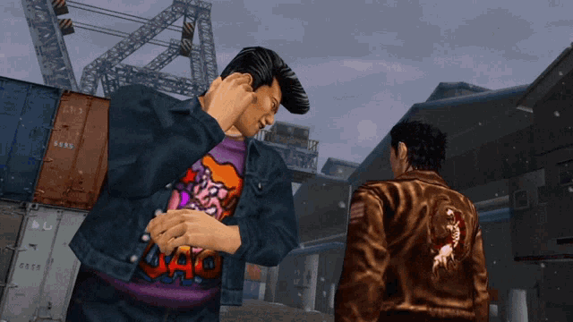 a man in a purple shirt with the word gato on it stands next to a man in a brown jacket