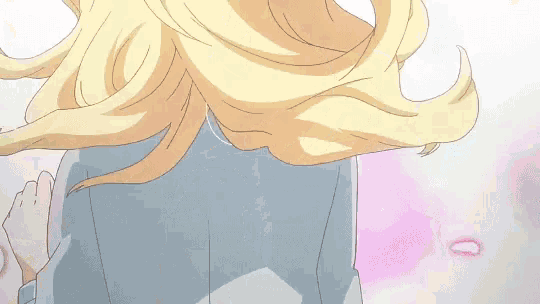 a girl with long blonde hair is wearing a blue jacket and tie