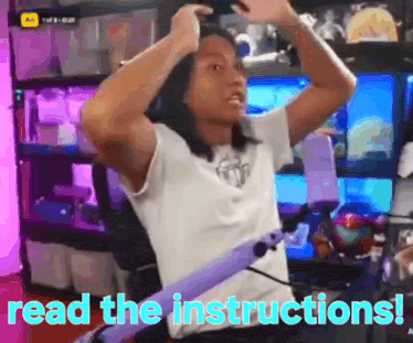 a man is sitting in a chair with his hands in the air and the words read the instructions written on the bottom .