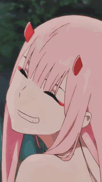 a girl with pink hair has red horns on her head