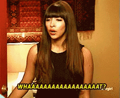 a woman with long hair and bangs says what a a a a a a a a a at