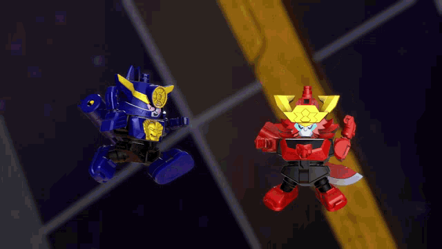 a blue robot and a red robot are standing next to each other on a dark background