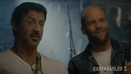 a movie poster for the expendables 2 shows two men