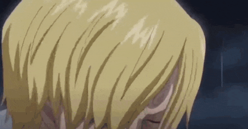 a close up of a person 's face with their eyes closed and their hair visible .