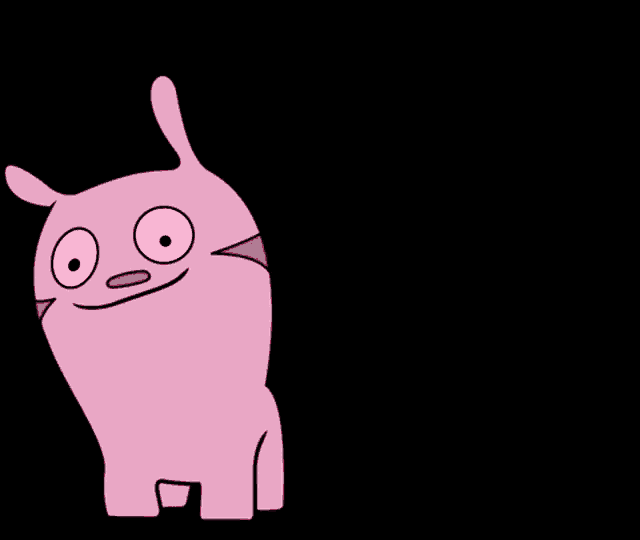 a pink monster with a white speech bubble that says gibberish