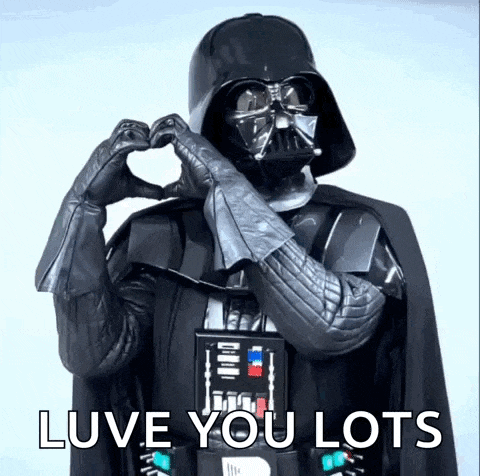 darth vader is making a heart shape with his hands and the words `` luve you lots '' .