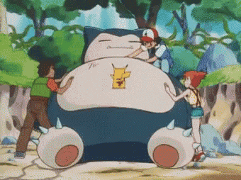 a group of cartoon characters are standing around a giant snorlax sleeping on the ground .