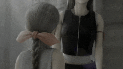 a girl with a pink bow in her hair is standing next to another girl in a black top