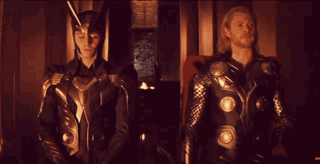two men in armor standing next to each other with the words " i 'll be along go on " written below them