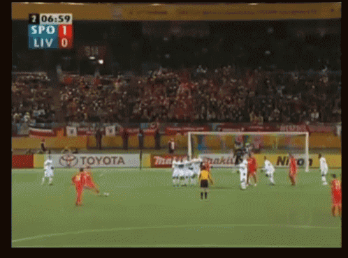 a soccer game is being played with toyota advertisements on the sidelines