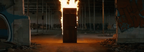 Burning Door Doorway GIF - Burning Door Doorway In Flames GIFs