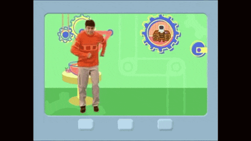 a man in a red sweater is dancing in front of a green screen