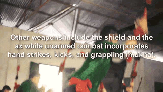 other weapons include the shield and the ax while unarmed combat incorporates hand strikes kicks and grappling ( mukha )