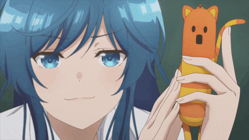 a girl with blue hair is holding a stuffed animal that has a surprised face on it